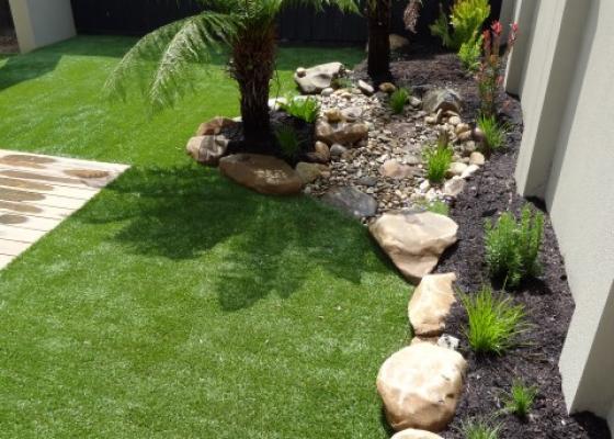 Turf / Lawns and stone edging border idea Melbourne Landscaping